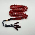 مسبحة باكالايت أحمر شفاف أنيقة – 51 حبّة – 10 مم – بكركوشة أحمر و أسود و ذهبي